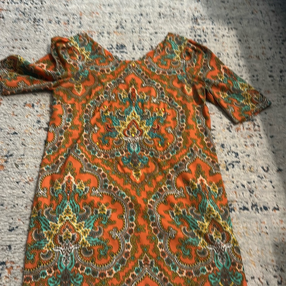 Woman Eci dress size is 14